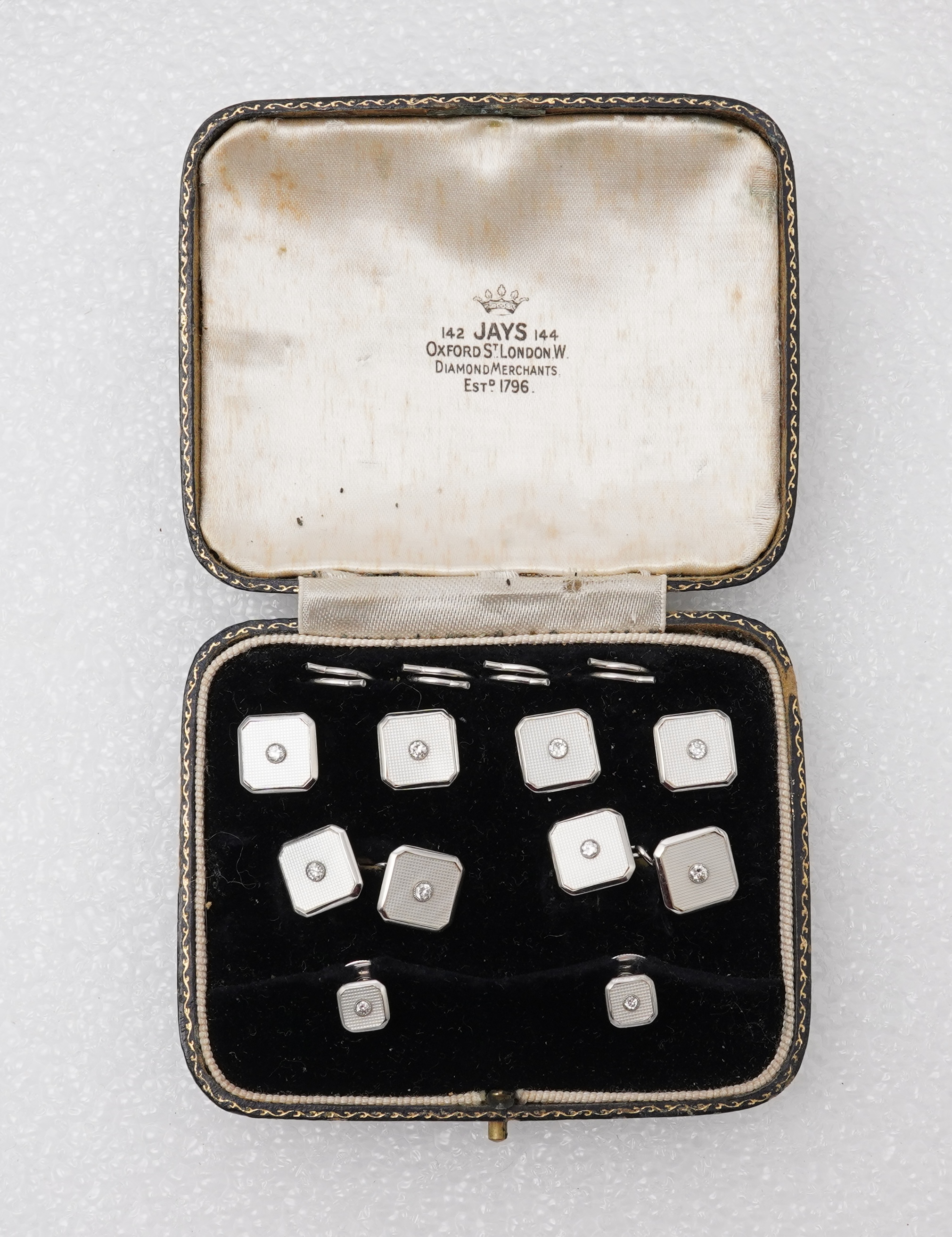 An Art Deco mother of pearl and diamond dress set, circa 1930